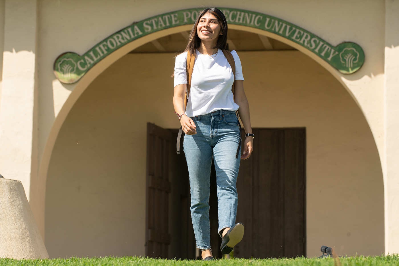 Monica Say walks across Cal Poly Pomona's campus.