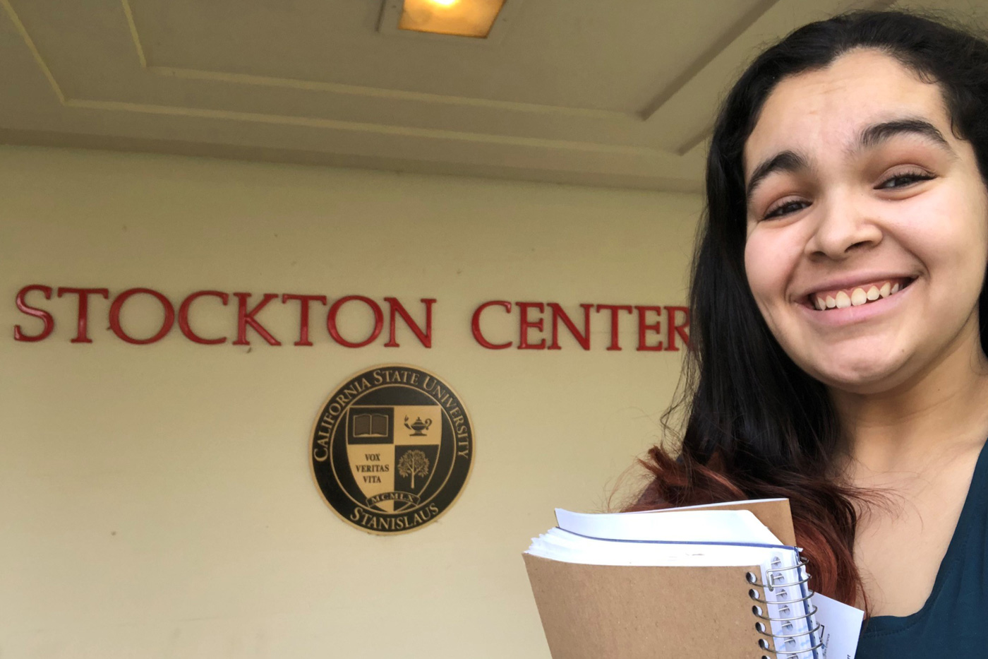 Victoria Castro-Chavez snaps a selfie on Stanislaus State's campus.