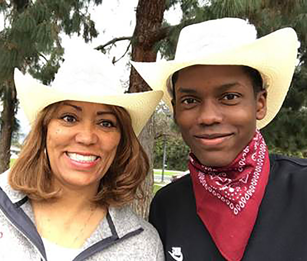 Josh poses with his mother.