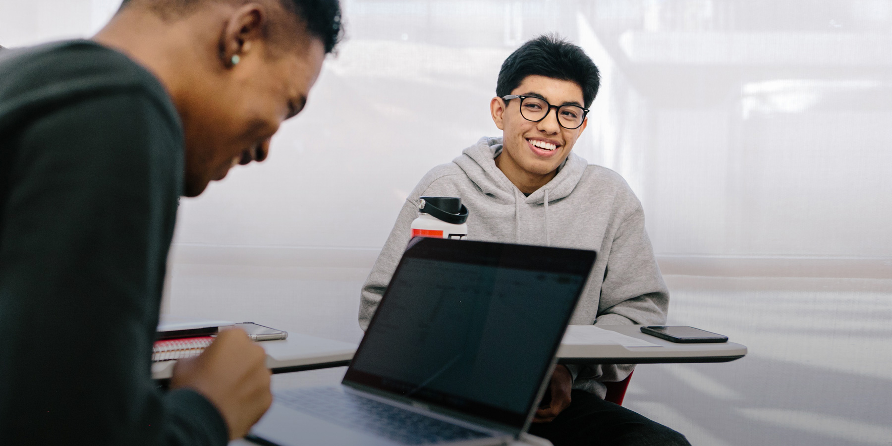 Roger studying with students