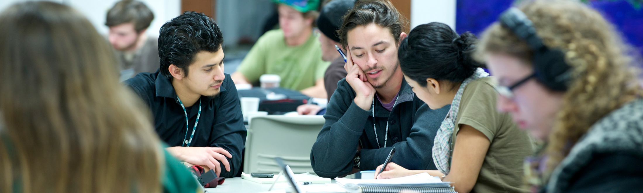 Students reading a book in class