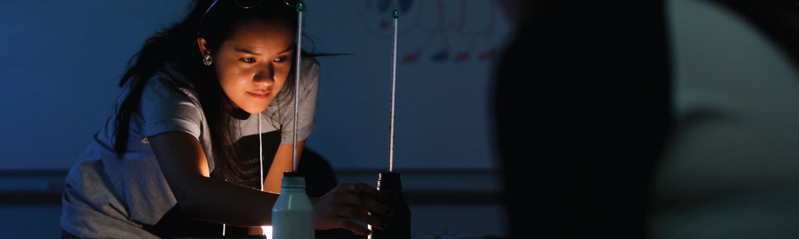 student performing research
