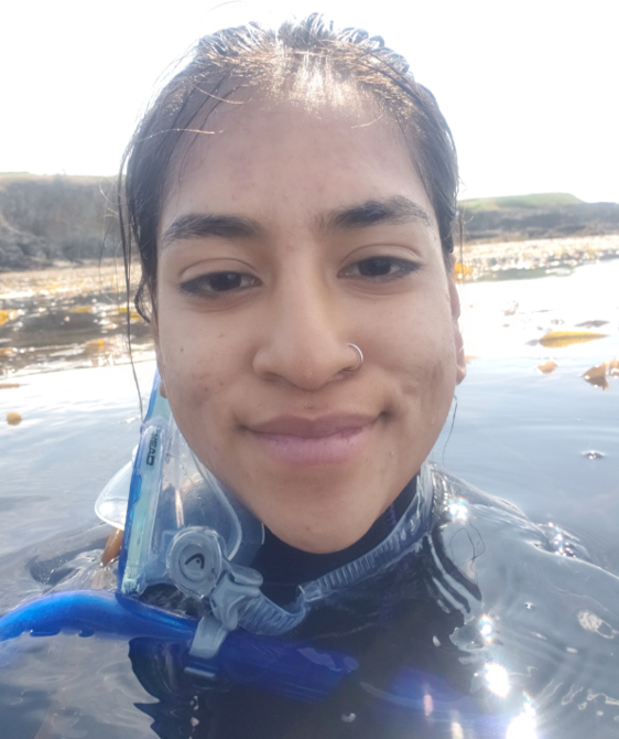 Mina Hernandez smiling for a picture